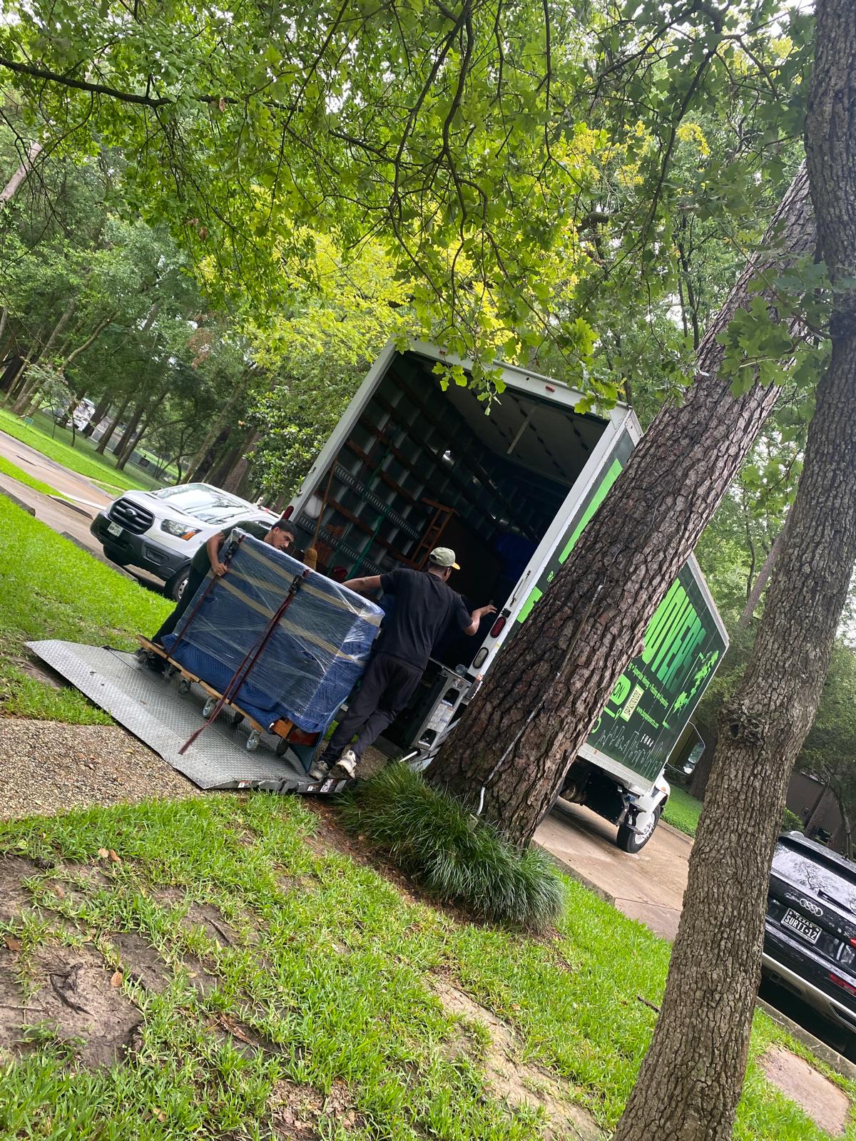 Bayou Movers crew loading the truck for a larger Houston move